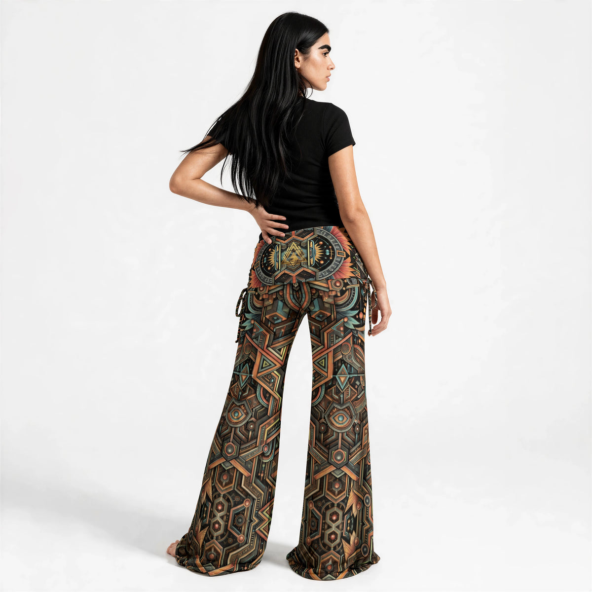 Back of the pants showing mirrored geometric artwork down both legs, decorative hip ties and the printed back waistband.